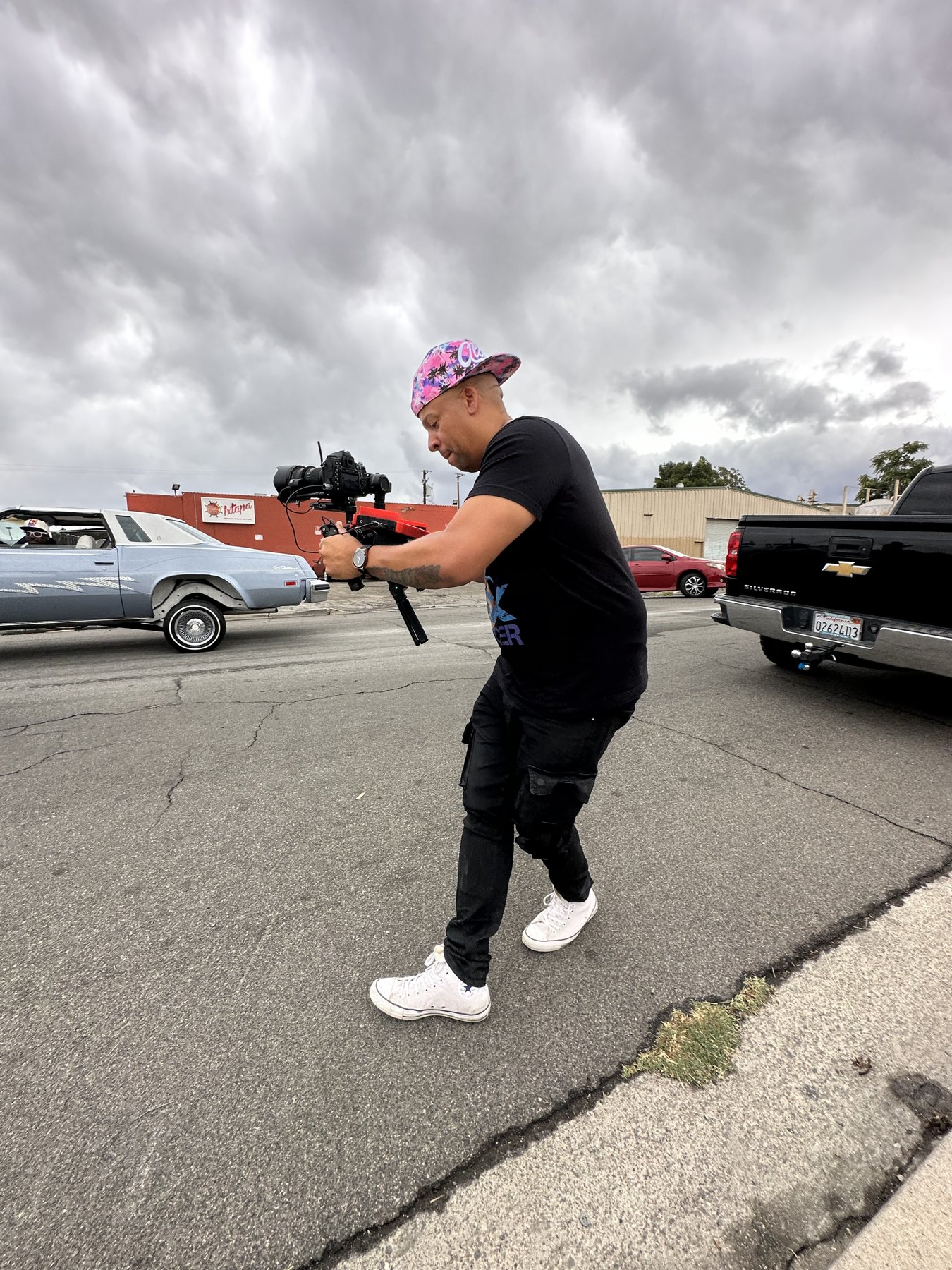 Mike filming outdoors with a camera stabilizer