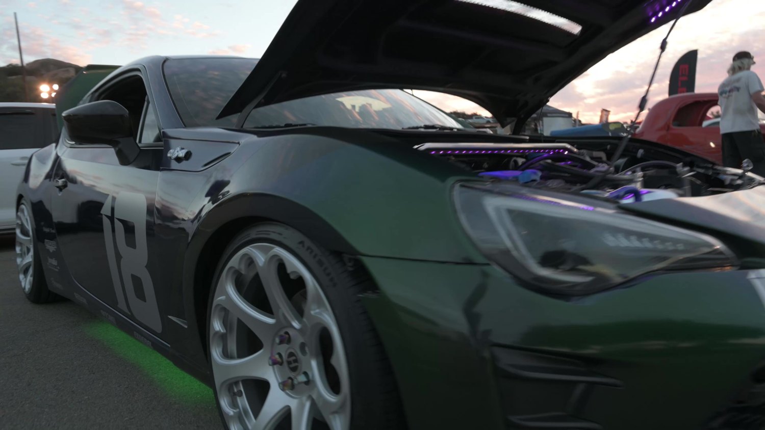 Racewars event film artwork featuring a sports car